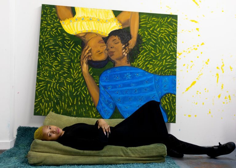 Education 9 Artist Sola Olulode in front of her painting Laying in the Grass